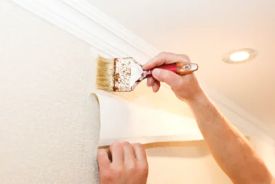 Pose de papier peint à Bû — revêtements muraux et toiles de verre